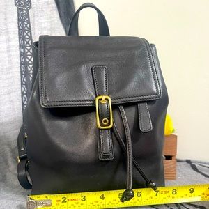 Black leather Coach mini backpack